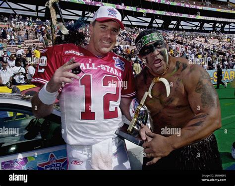 Oakland Raiders and AFC Pro Bowl starting quarterback Rich Gannon celebrates his team's 38-30 ...