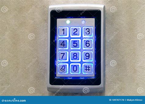 The Numeric Keypad is Mounted on the Wall. Blue Keyboard Light Stock ...