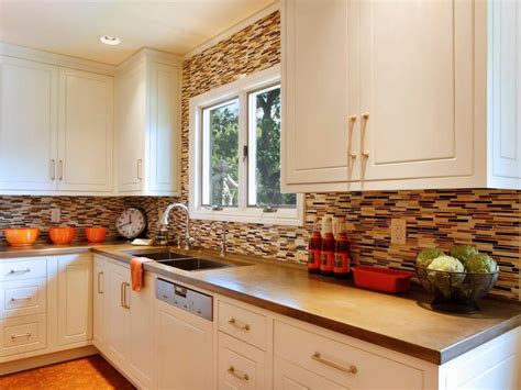 Brown Tile Backsplash Accents White Cabinets | Contemporary kitchen tiles, Brown kitchen tiles ...