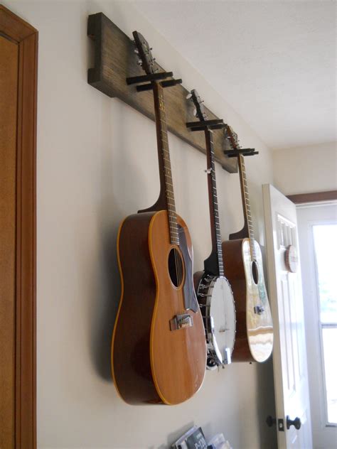 Make It Easy to Do Your Thing (DIY guitar hanger) | Guitar wall hanger, Diy guitar stand, Guitar ...