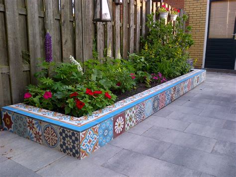 Some left over cement tiles create a great and happy border in your ...