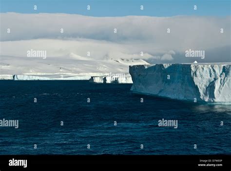 Antarctic sound Graham Land tabular iceberg continental mountains glaciers and ocean Stock Photo ...