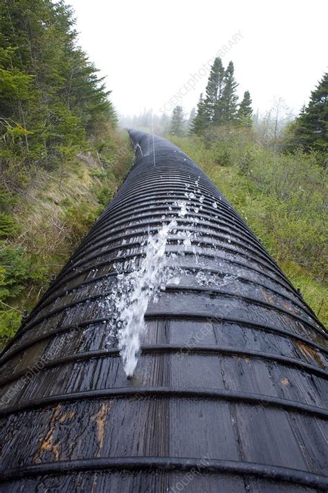 Wooden penstock - Stock Image - C001/1222 - Science Photo Library