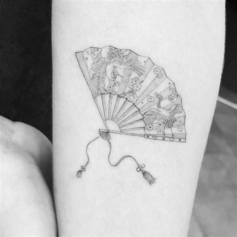 Fan tattoo | Fan tattoo, Picture tattoos, Small hand tattoos