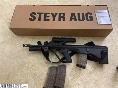 ARMSLIST - For Sale: Steyr AUG black with 3.0x integrated optics+sling+2 extra mags