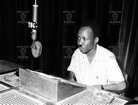 Mwalimu Julius Nyerere is photographed at a radio station giving a ...