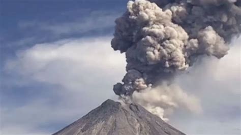 Incredible video shows Ring of Fire volcano spewing huge ash column as it erupts TWICE in one ...