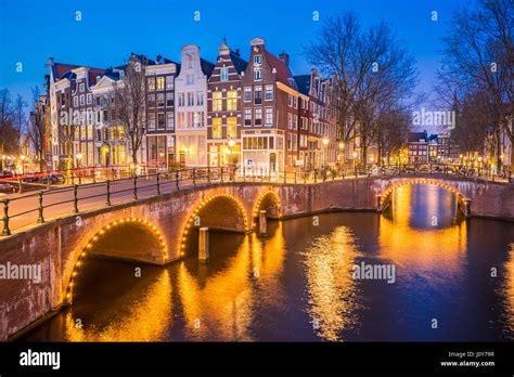 Night view of Amsterdam city skyline at night in Netherlands Stock ...