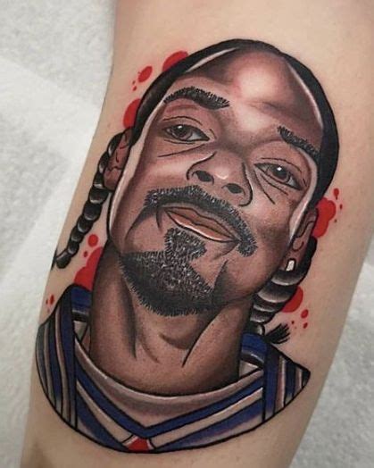 Pin on Snoop Dogg Tattoos