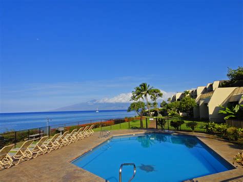 A beautiful quiet morning - island of Molokai in the background. Napili Point Resort, Maui ...