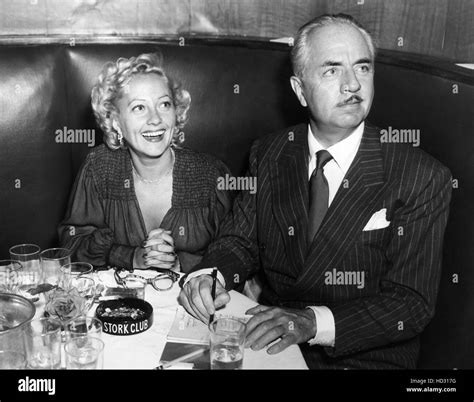 William Powell, wife, Diane Lewis at the Stork Club, 1948 Stock Photo ...