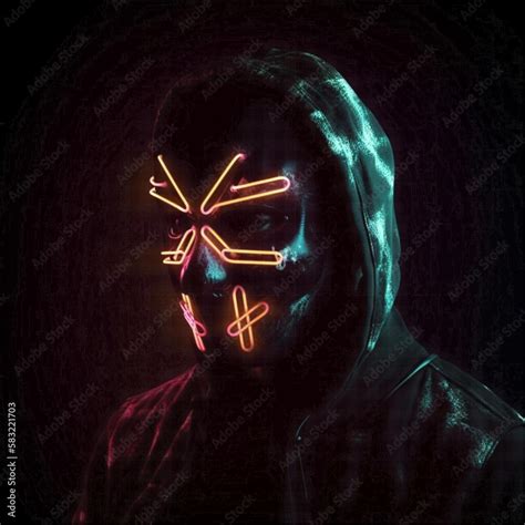 Cyberpunk man in a black leather mask with glowing orange neon elements on a black background. A ...