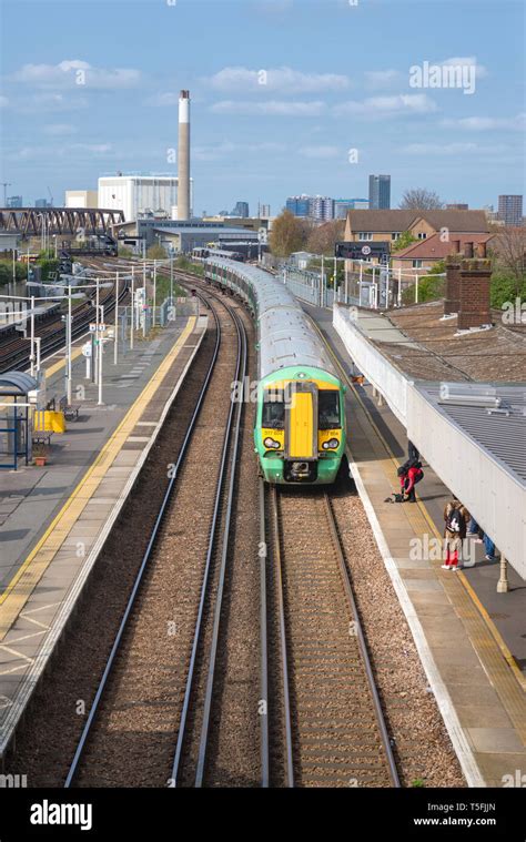 Passenger train at New Cross Gate station in London, England Stock ...