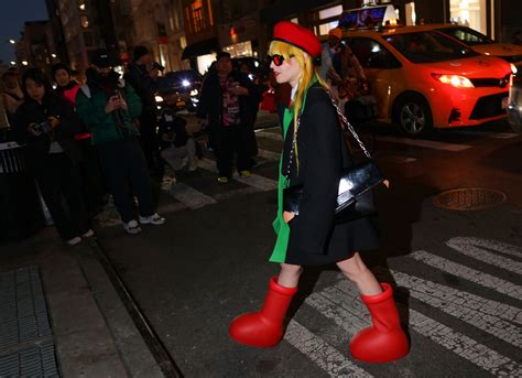 Everyone Is Wearing MSCHF's Big Red Boots | Vogue