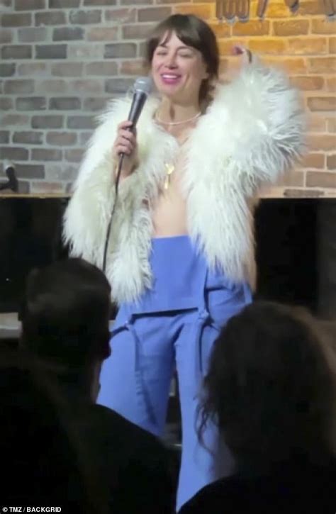 Comedian Natasha Leggero shocks fans by stripping down and going TOPLESS onstage as she follows ...