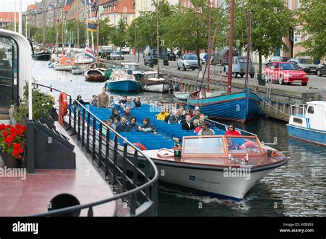 Sightseeing tour boat on Christianhavn canal, Copenhagen, Denmark Stock ...