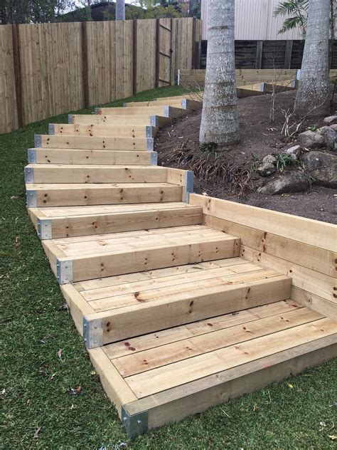 Retaining walls created multiple terraces using galvanised steel posts ...