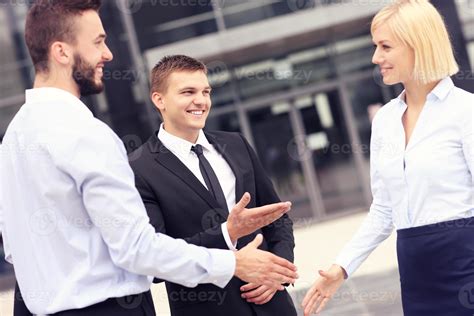 Business people greeting outside modern building 15878689 Stock Photo ...