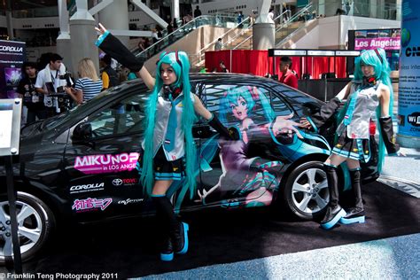 Hatsune Miku in front of a customized Toyota Corolla the o… | Flickr