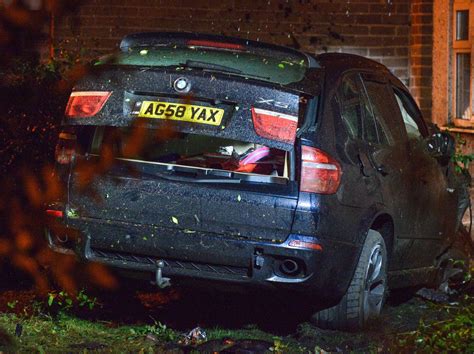 'The bonnet's in the kitchen': Car ploughs through hedge and house in Black Country crash ...