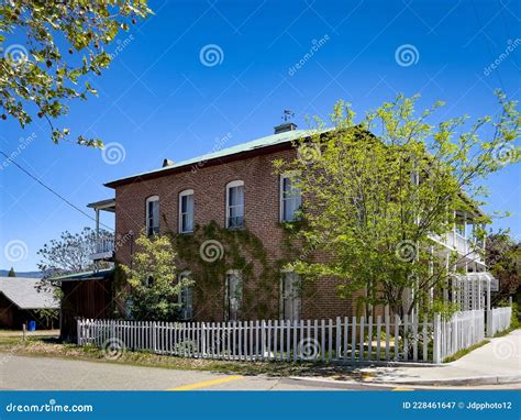 White Picket Fence In The Front Yard Of A Wooden Historic Cabin Editorial Photo | CartoonDealer ...