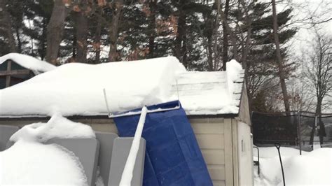 Home made roof snow removal tool - YouTube