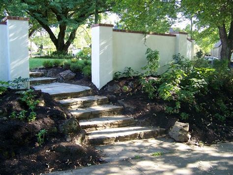 parged stone wall with brick cap | Front courtyard, Outdoor inspirations, Stone wall