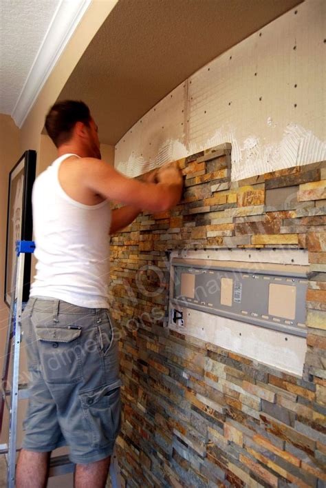 Installing a TV on a Stacked Stone Wall | TV Stone Wall | Stone wall ...