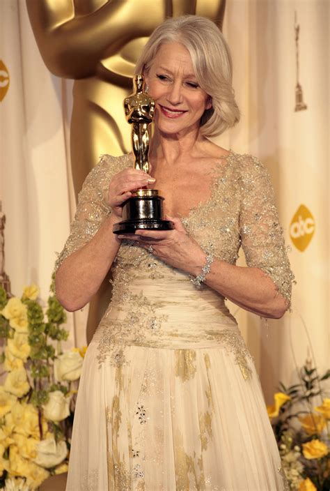 Helen Mirren - winner of the Best Actress Oscar for her performance in "The Queen" - poses for ...