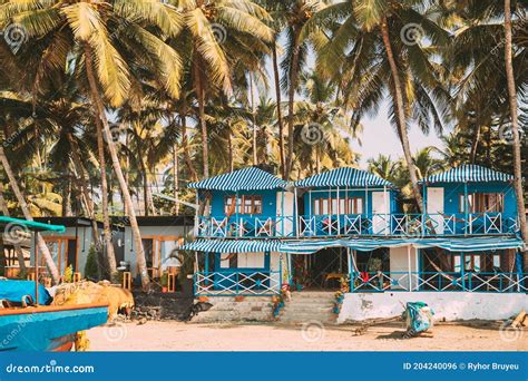 Canacona, Goa, India. Famous Painted Guest Houses on Palolem Beach Against Background of Tall ...