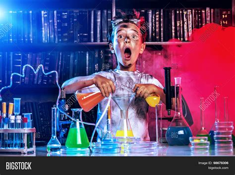 Boy Doing Experiments Laboratory. Image & Photo | Bigstock