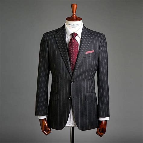 Often when you think of somebody in a black pinstripe suit paired with ...