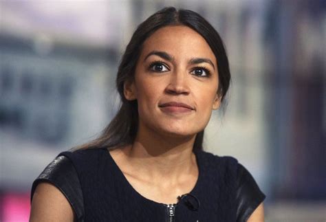 Is This a Photo of Alexandria Ocasio-Cortez Being Held in the Air? | Snopes.com