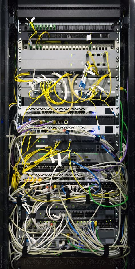 "Detail Of A Communications Rack, Fiber, Internet, Network, Switc" by Stocksy Contributor "ACALU ...