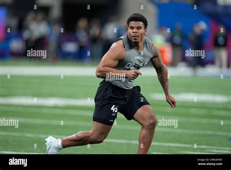 Penn State defensive lineman Chop Robinson runs a drill at the NFL ...