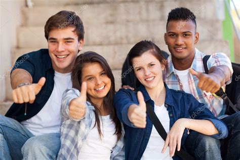 High school students giving thumbs up Stock Photo by ©michaeljung 26746839