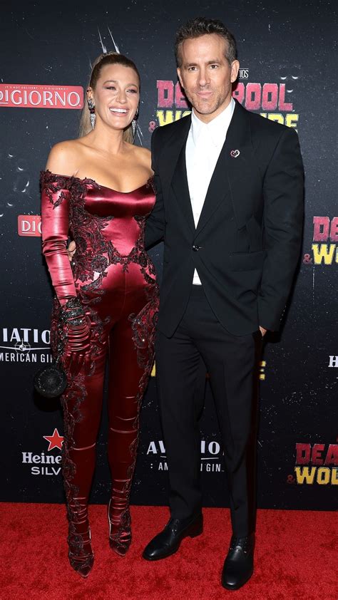 Blake Lively stuns in red as she poses with Ryan Reynolds at 'Deadpool & Wolverine' premiere ...