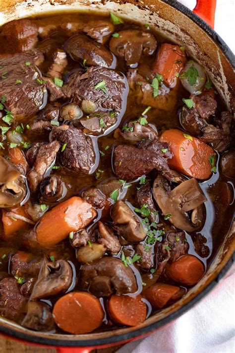 Beef Bourguignon made with pearl onions, carrots, mushrooms, beef, and burgundy red wine is a ...