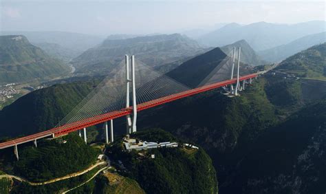 World's highest bridge: majestic beipanjiang bridge stands 565 meters above a river valley in ...