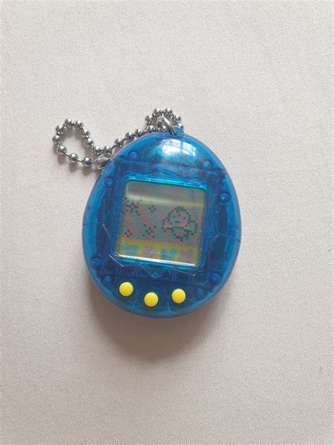 Original blue tamagotchi, Hobbies & Toys, Toys & Games on Carousell