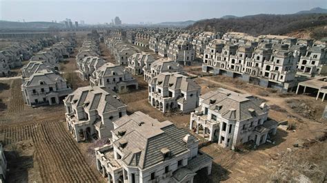 The Story Behind the Many Ghost Towns of Abandoned Mansions Across China - Architectural Digest ...