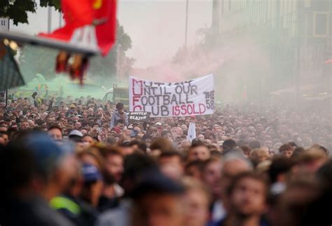 Manchester United fans march in anti-Glazer protest before Liverpool ...