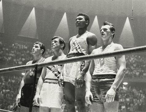 Cassius Clay (Muhammad Ali) captures gold medal at the Rome Olympics ...