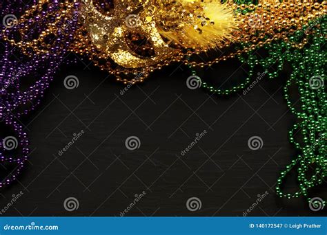 Purple, Gold, And Green Mardi Gras Beads And Mask Stock Image - Image of celebrate, purple ...