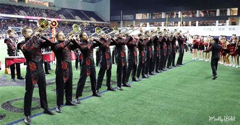 Mind blowing marching band routine involves trombones, extreme timing, and some close calls ...