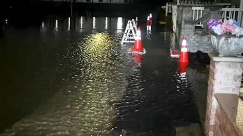 NYC Flooding: Howard Beach, Queens residents cope with flooding due to rain, high tide - ABC7 ...