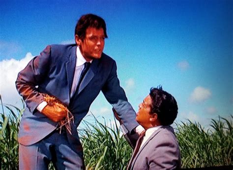 Jack Lord as Steve McGarrett and Zulu as Kono in Hawaii Five-O season 1 ...