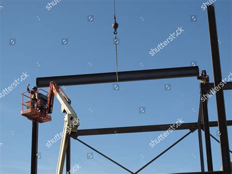 Two Construction Workers Ease Steel Girder Editorial Stock Photo - Stock Image | Shutterstock