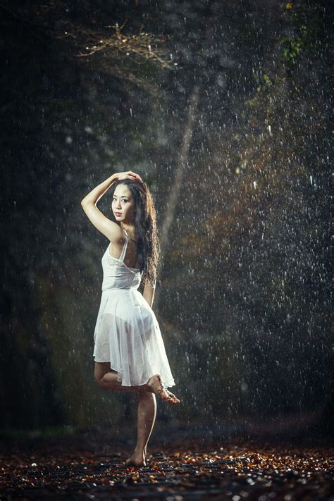 How to Shoot Magical Portraits in the Pouring Rain | Rainy photoshoot, Portrait photoshoot ...