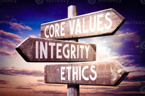 Core Values, integrity, Ethics - Wooden Signpost with Three Arrows, Sunset Sky in Background ...